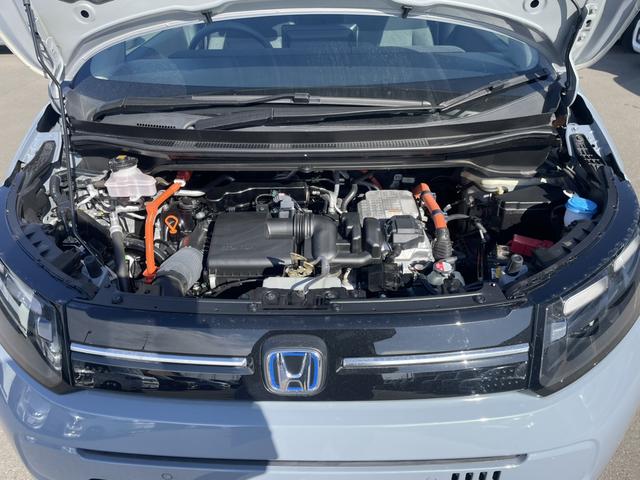 フリード ｅ：ＨＥＶエアーＥＸ　ワンオーナー　禁煙車　純正ナビ　ＥＴＣ　ブラインドスポットインフォメーション　両側電動ドア　ＥＳＣ　ＤＶＤ　サイドエアバッグ　フルオートエアコン　全周囲カメラ　前後誤発進抑制　両側ＰＳＤ　フルセグ（25枚目）