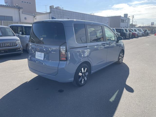 フリード ｅ：ＨＥＶエアーＥＸ　ワンオーナー　禁煙車　純正ナビ　ＥＴＣ　ブラインドスポットインフォメーション　両側電動ドア　ＥＳＣ　ＤＶＤ　サイドエアバッグ　フルオートエアコン　全周囲カメラ　前後誤発進抑制　両側ＰＳＤ　フルセグ（30枚目）