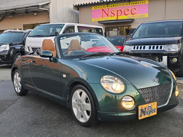 コペン タンレザーエディション タンレザーエディション 電動オープン ストラーダナビ ETC シートヒーターオートマ ウッドコンビステア 純正アルミホイール キーレス(2枚目)