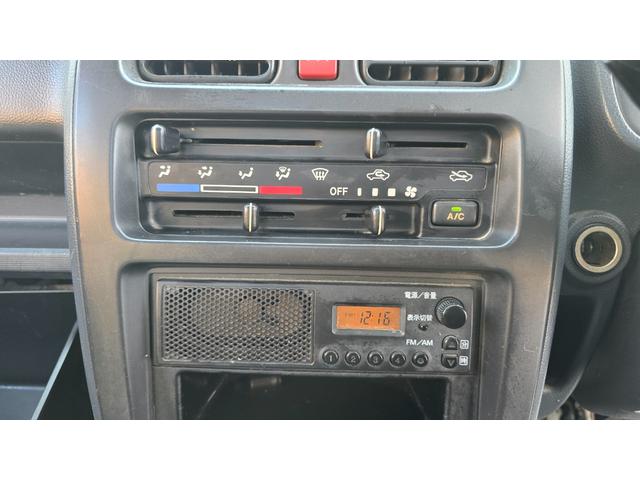 キャリイトラック ＫＣエアコン・パワステ　全国対応２年保証　オートマ　２ＷＤ　エアコン　パワステ　三方開　タイミングチェーン　積載量３５０ｋｇ　純正ラジオ（25枚目）