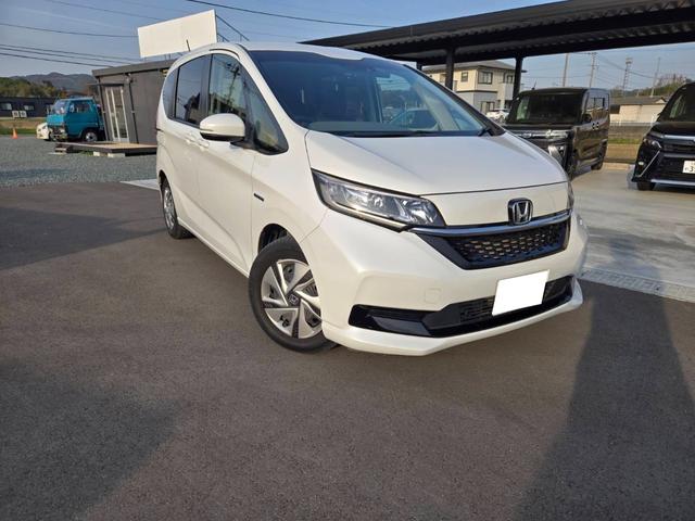 フリードハイブリッド 　Ｇ　ホンダセンシング　両側パワースライドドア　ナビ　Ｂｌｕｅｔｏｏｔｈ　Ｂモニター　スマートキー　プッシュスタートボタン　フロントドラレコ　ＥＴＣ（3枚目）