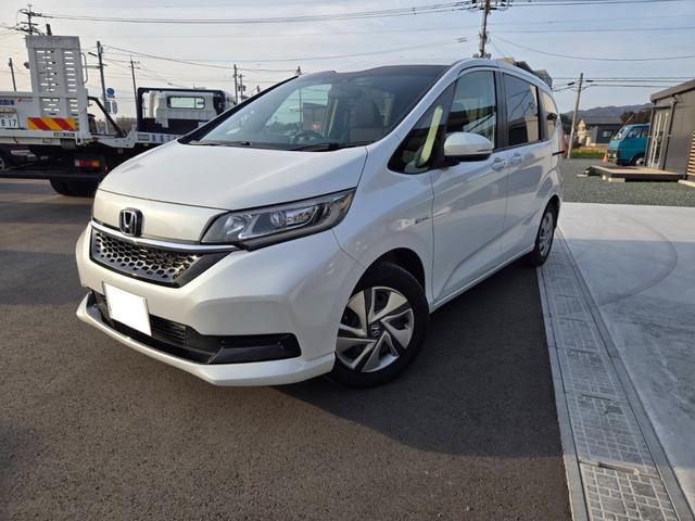 フリードハイブリッド 　Ｇ　ホンダセンシング　両側パワースライドドア　ナビ　Ｂｌｕｅｔｏｏｔｈ　Ｂモニター　スマートキー　プッシュスタートボタン　フロントドラレコ　ＥＴＣ（4枚目）