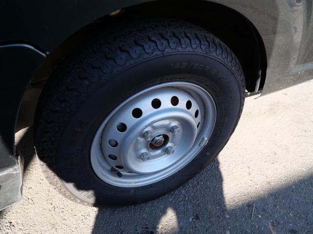 キャリイトラック 農繁スペシャル　セレクト４ＷＤ車　エアコン　パワーステアリング　パワーウィンドウ　Ｗエアバッグ　記録簿　キーレスエントリー　作業灯　三方開（11枚目）