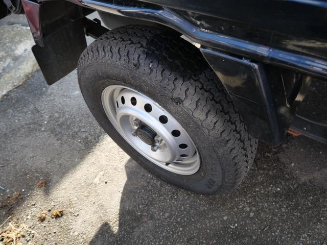 キャリイトラック ＫＣスペシャル　セレクト４ＷＤ車　エアコン　パワーステアリング　パワーウインドウ　Ｗエアバッグ　キーレスエントリー　ＥＴＣ　ラジオ　レザー調シートカバー　三方開（13枚目）