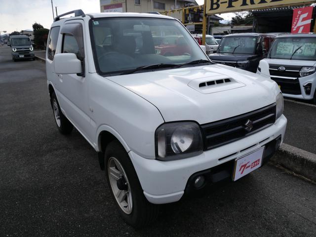 ジムニー ＸＣ　ＣＤ　キーレスエントリー　電動格納ミラー　ライトレベル調節　記録簿　純正１６インチアルミホイール　背面タイヤ　パワーウィンドウ（4枚目）