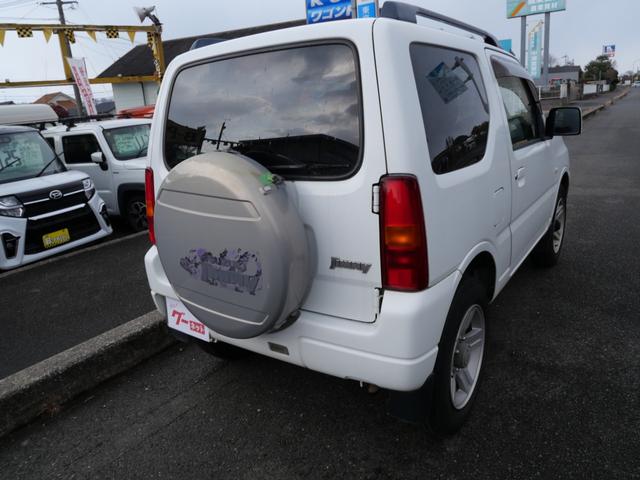 ジムニー ＸＣ　ＣＤ　キーレスエントリー　電動格納ミラー　ライトレベル調節　記録簿　純正１６インチアルミホイール　背面タイヤ　パワーウィンドウ（5枚目）