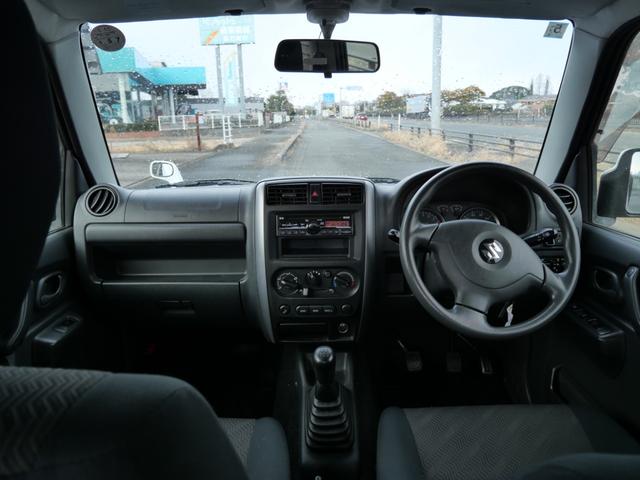 ジムニー ＸＣ　ＣＤ　キーレスエントリー　電動格納ミラー　ライトレベル調節　記録簿　純正１６インチアルミホイール　背面タイヤ　パワーウィンドウ（8枚目）