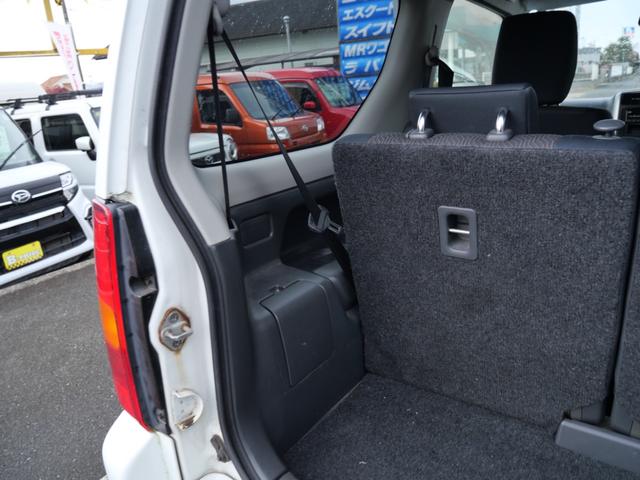 ジムニー ＸＣ　ＣＤ　キーレスエントリー　電動格納ミラー　ライトレベル調節　記録簿　純正１６インチアルミホイール　背面タイヤ　パワーウィンドウ（22枚目）