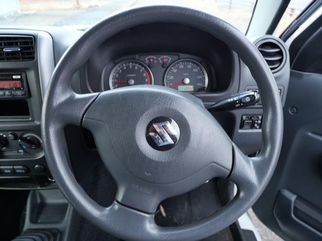 ジムニー ＸＣ　ＣＤ　キーレスエントリー　電動格納ミラー　ライトレベル調節　記録簿　純正１６インチアルミホイール　背面タイヤ　パワーウィンドウ（30枚目）