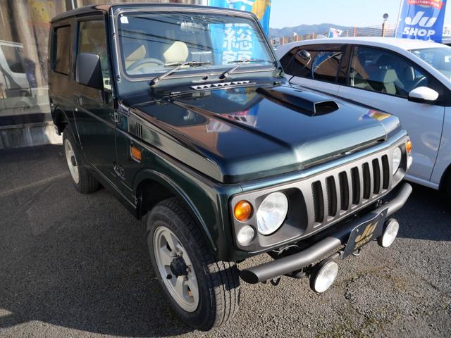 ジムニー ワイルドウインド　メモリーナビ　ＴＶ　ＣＤ　社外キーレスエントリー　社外デジタルインナーミラー　レザー調シートカバー　ＥＴＣ　ＦＲバンパー（4枚目）