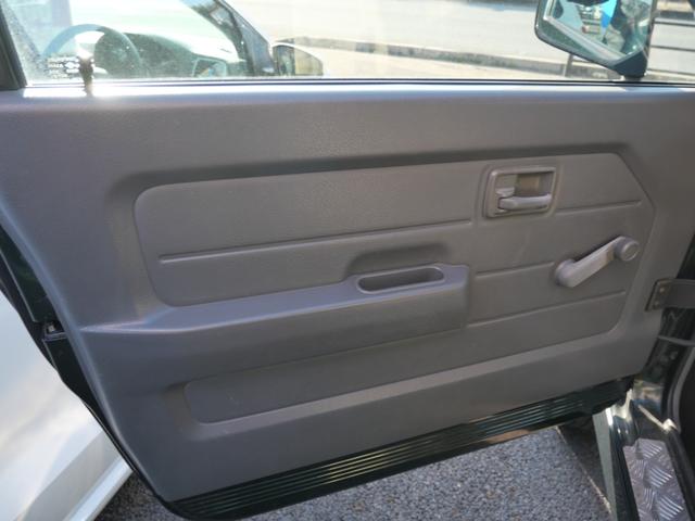 ジムニー ワイルドウインド　メモリーナビ　ＴＶ　ＣＤ　社外キーレスエントリー　社外デジタルインナーミラー　レザー調シートカバー　ＥＴＣ　ＦＲバンパー（12枚目）