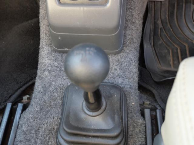 ジムニー ワイルドウインド　メモリーナビ　ＴＶ　ＣＤ　社外キーレスエントリー　社外デジタルインナーミラー　レザー調シートカバー　ＥＴＣ　ＦＲバンパー（24枚目）