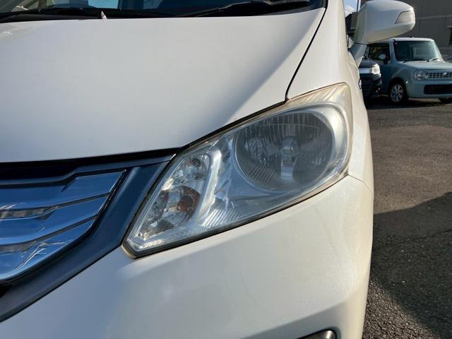 フリードハイブリッド ジャストセレクション　ワンオーナー　禁煙車　ナビ　ワンセグＴＶ　バックカメラ　社外ＬＥＤヘッドライト　純正アルミ　両側パワースライドドア　プライバシーガラス　クルーズコントロール　スマートキー（8枚目）