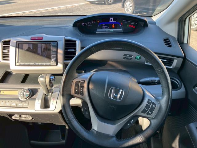 フリードハイブリッド ジャストセレクション　ワンオーナー　禁煙車　ナビ　ワンセグＴＶ　バックカメラ　社外ＬＥＤヘッドライト　純正アルミ　両側パワースライドドア　プライバシーガラス　クルーズコントロール　スマートキー（25枚目）