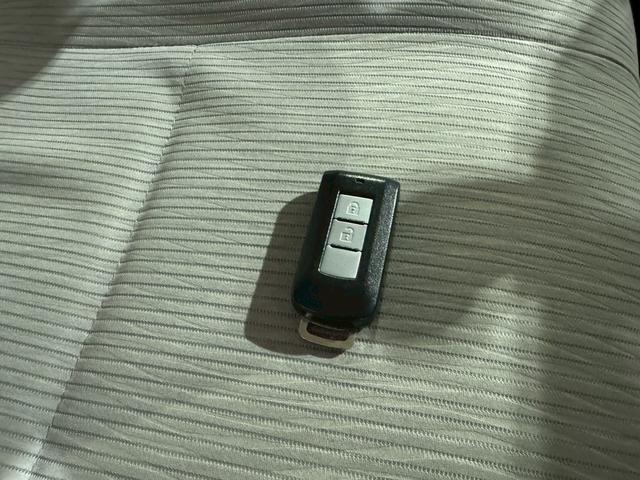 ｅＫワゴン Ｇ　アイドリングストップ　ナビ地デジＴＶ　スマートキー　ＥＴＣ　プッシュスターター　オートエアコン　電動格納ドアミラー　ベンチシート　純正１４インチアルミホイール（10枚目）