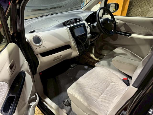 ｅＫワゴン Ｇ　アイドリングストップ　ナビ地デジＴＶ　スマートキー　ＥＴＣ　プッシュスターター　オートエアコン　電動格納ドアミラー　ベンチシート　純正１４インチアルミホイール（22枚目）