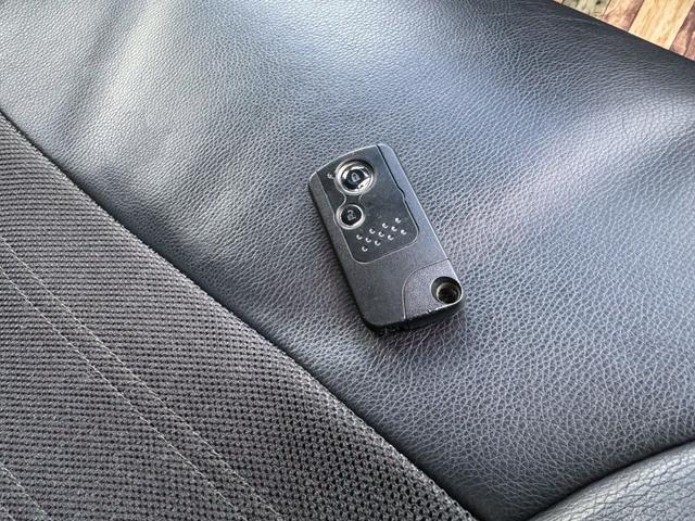 フィットハイブリッド スマートセレクション 車検令和10年2月 ナビ地デジTV Hondaスマートキーシステム オートエアコン 電動格納ドアミラー クルーズコントロール HIDヘッドライト 社外アルミホイール(9枚目)