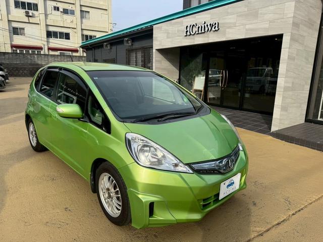 フィットハイブリッド スマートセレクション 車検令和10年2月 ナビ地デジTV Hondaスマートキーシステム オートエアコン 電動格納ドアミラー クルーズコントロール HIDヘッドライト 社外アルミホイール(24枚目)