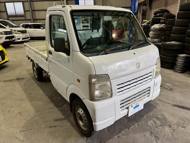 キャリイトラック ＫＣエアコン・パワステ　パートタイム４ＷＤ　高低二段切替式　タイミングチェーン　三方開　積載可能量３５０ｋｇ　５速ミッション　エアコン　パワーステアリング（10枚目）