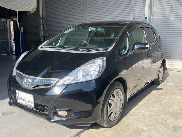 フィットハイブリッド ハイブリッド・１０ｔｈアニバーサリー　ナビ　バックカメラ　ＥＴＣ　ステアリングスイッチ　ＴＶ　ＤＶＤ再生　Ｂｌｕｅｔｏｏｔｈ（2枚目）