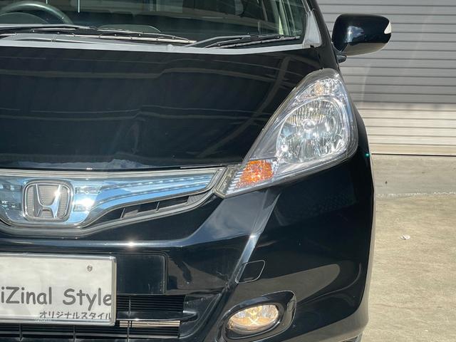 フィットハイブリッド ハイブリッド・１０ｔｈアニバーサリー　ナビ　バックカメラ　ＥＴＣ　ステアリングスイッチ　ＴＶ　ＤＶＤ再生　Ｂｌｕｅｔｏｏｔｈ（8枚目）