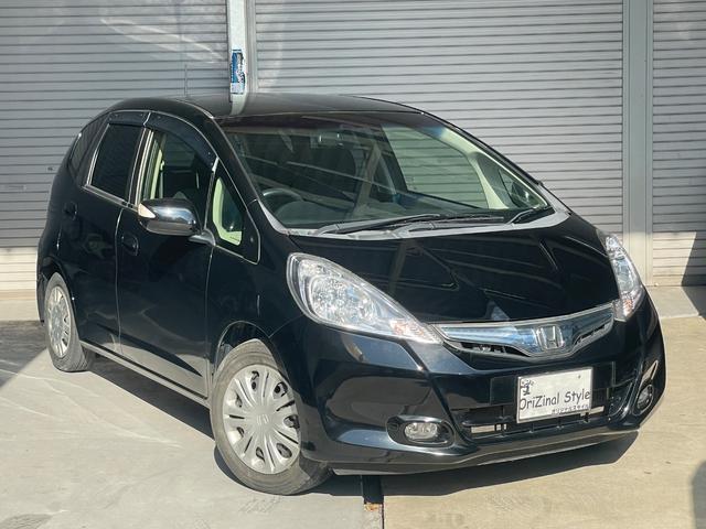 フィットハイブリッド ハイブリッド・１０ｔｈアニバーサリー　ナビ　バックカメラ　ＥＴＣ　ステアリングスイッチ　ＴＶ　ＤＶＤ再生　Ｂｌｕｅｔｏｏｔｈ（31枚目）