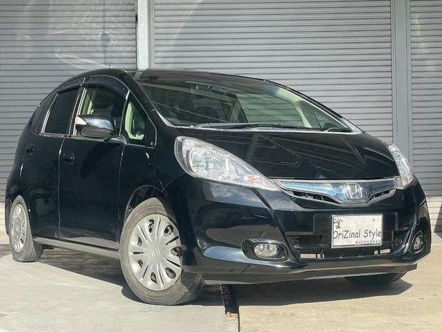 フィットハイブリッド ハイブリッド・１０ｔｈアニバーサリー　ナビ　バックカメラ　ＥＴＣ　ステアリングスイッチ　ＴＶ　ＤＶＤ再生　Ｂｌｕｅｔｏｏｔｈ（33枚目）