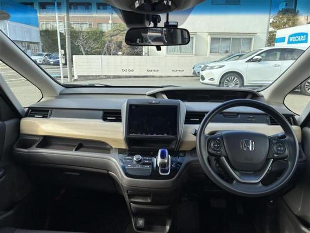 フリードハイブリッド ハイブリッドＧホンダセンシング　純正　９インチ　ＳＤナビ／ホンダセンシング／両側電動スライドドア／車線逸脱防止支援システム／ドライブレコーダー　社外／ヘッドランプ　ＬＥＤ／Ｂｌｕｅｔｏｏｔｈ接続／ＥＴＣ／ＥＢＤ付ＡＢＳ　バックカメラ（4枚目）