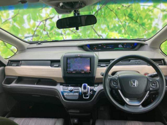 フリードハイブリッド ハイブリッドＧホンダセンシング　社外　８インチ　ＳＤナビ／ホンダセンシング／両側電動スライドドア／車線逸脱防止支援システム／ドライブレコーダー　社外／ヘッドランプ　ＬＥＤ／Ｂｌｕｅｔｏｏｔｈ接続／ＥＴＣ／ＥＢＤ付ＡＢＳ　バックカメラ（4枚目）