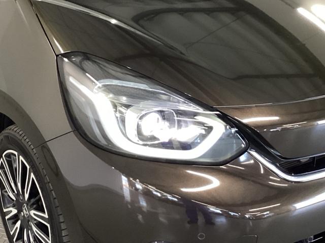 フィット ｅ：ＨＥＶリュクス　純正メモリーナビ　ドラレコ　リアカメラ、　誤発進抑制機能　本革シート　ＥＴＣ付　ＬＥＤ　シートヒーター　クルーズコントロール　セキュリティアラーム　ドライブレコーダー　ＤＶＤ　ＶＳＡ　フルセグ　ＵＳＢ（22枚目）