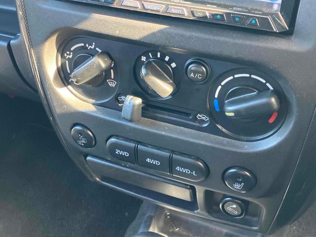 ジムニー ワイルドウインド 4WD ナビ キーレスエントリー 電動格納ミラー シートヒーター MT 盗難防止システム ABS CD DVD再生 ミュージックプレイヤー接続可 Bluetooth ルーフレール アルミホイール(6枚目)