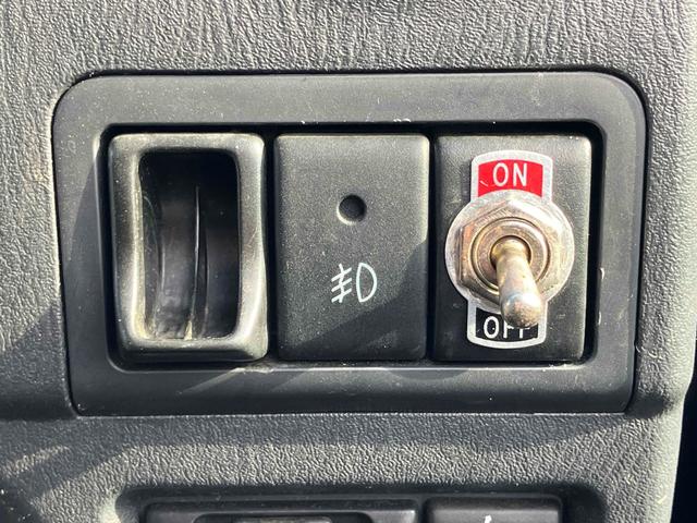 ジムニー ワイルドウインド 4WD ナビ キーレスエントリー 電動格納ミラー シートヒーター MT 盗難防止システム ABS CD DVD再生 ミュージックプレイヤー接続可 Bluetooth ルーフレール アルミホイール(8枚目)