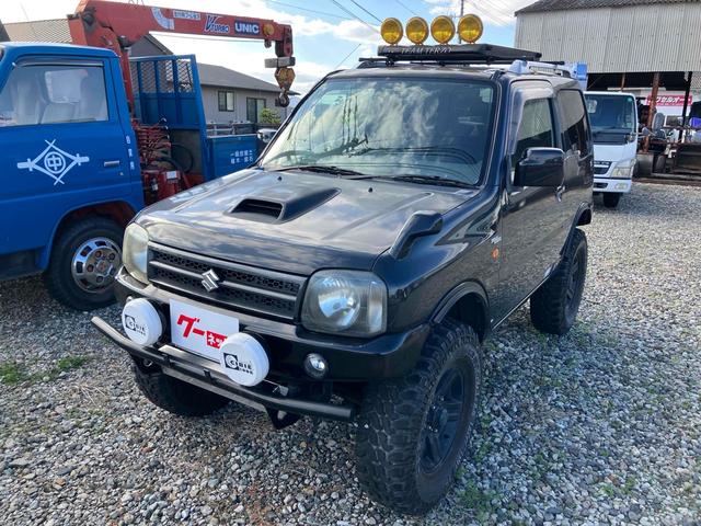 ジムニー ワイルドウインド 4WD ナビ キーレスエントリー 電動格納ミラー シートヒーター MT 盗難防止システム ABS CD DVD再生 ミュージックプレイヤー接続可 Bluetooth ルーフレール アルミホイール(12枚目)