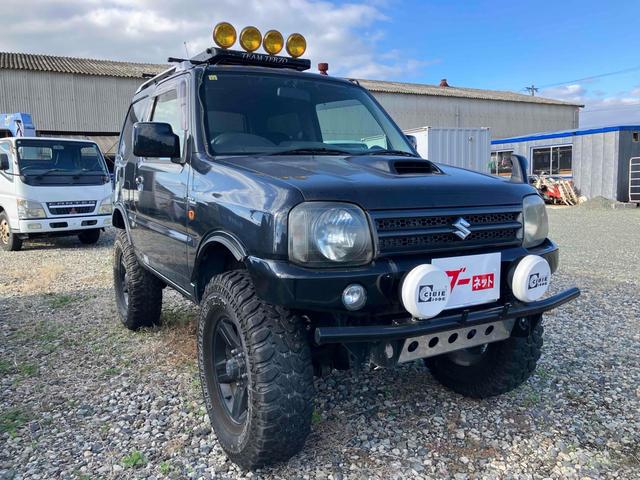 ジムニー ワイルドウインド 4WD ナビ キーレスエントリー 電動格納ミラー シートヒーター MT 盗難防止システム ABS CD DVD再生 ミュージックプレイヤー接続可 Bluetooth ルーフレール アルミホイール(14枚目)