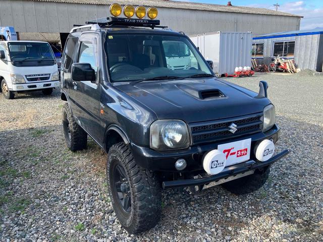 ジムニー ワイルドウインド 4WD ナビ キーレスエントリー 電動格納ミラー シートヒーター MT 盗難防止システム ABS CD DVD再生 ミュージックプレイヤー接続可 Bluetooth ルーフレール アルミホイール(15枚目)