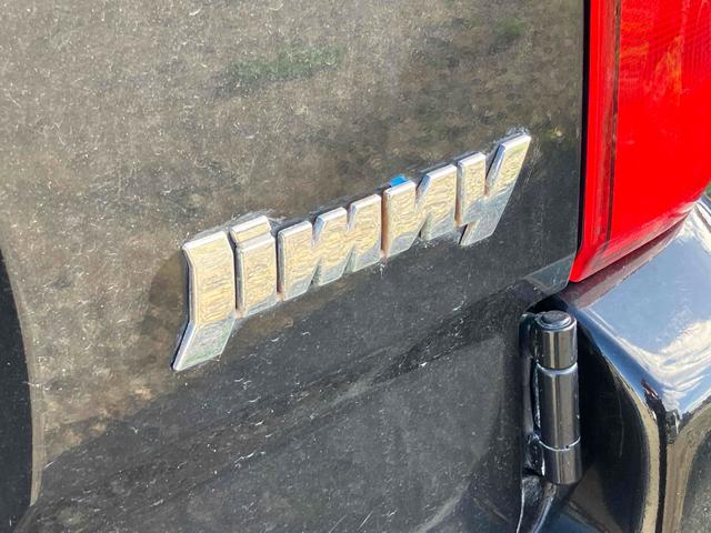 ジムニー ワイルドウインド 4WD ナビ キーレスエントリー 電動格納ミラー シートヒーター MT 盗難防止システム ABS CD DVD再生 ミュージックプレイヤー接続可 Bluetooth ルーフレール アルミホイール(23枚目)