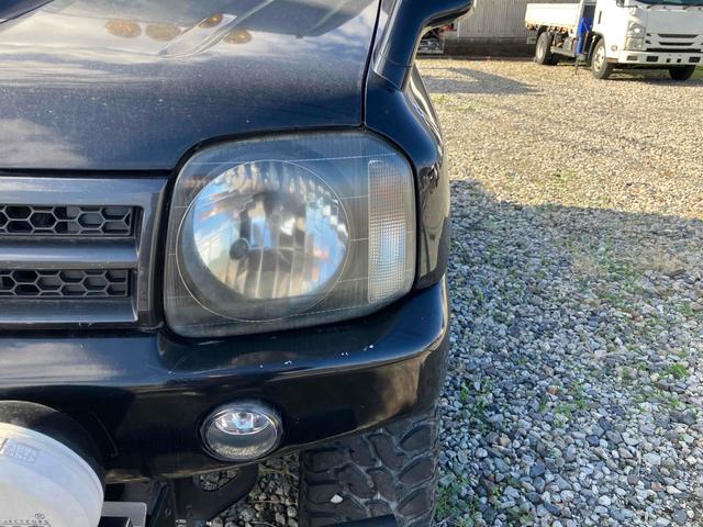 ジムニー ワイルドウインド 4WD ナビ キーレスエントリー 電動格納ミラー シートヒーター MT 盗難防止システム ABS CD DVD再生 ミュージックプレイヤー接続可 Bluetooth ルーフレール アルミホイール(31枚目)