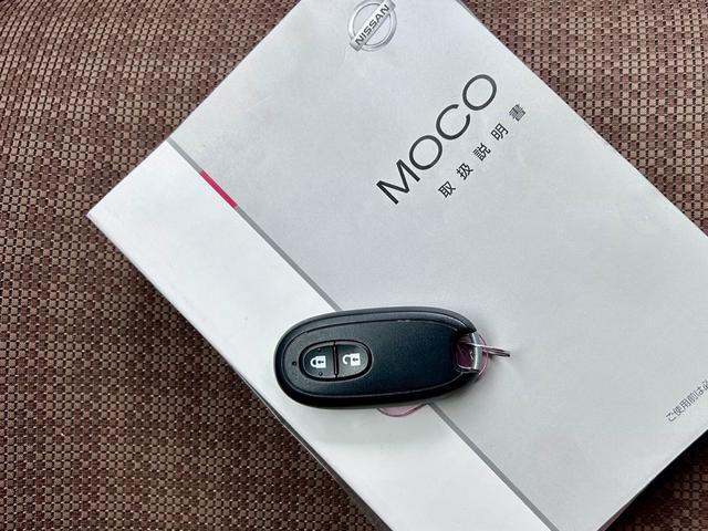 モコ Ｘ　禁煙車　車検２年付　インテリジェントキー　プッシュスターター　電動格納ドアミラー　オートエアコン　ベンチシート　エアロ　取扱説明書（7枚目）