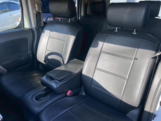 キューブ ライダー 禁煙車 走行69030km ナビ地デジTV インテリジェントキー ベンチシート 黒革調シートカバー ダウンサス 純正エアロ 純正アルミホイール(18枚目)