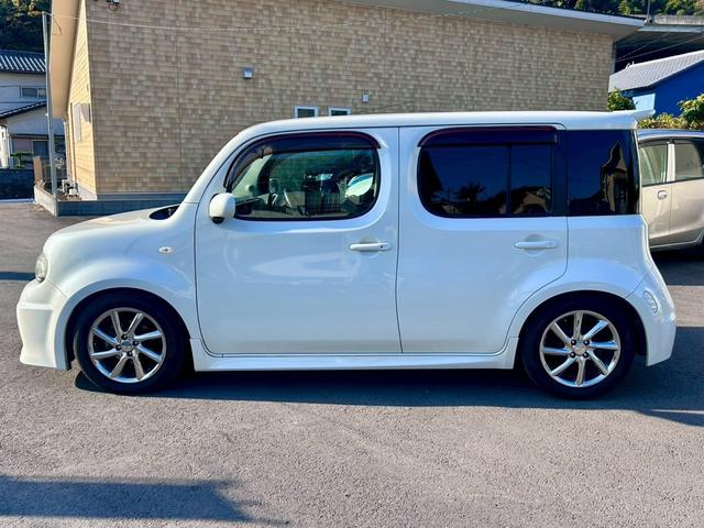 キューブ ライダー 禁煙車 走行69030km ナビ地デジTV インテリジェントキー ベンチシート 黒革調シートカバー ダウンサス 純正エアロ 純正アルミホイール(25枚目)