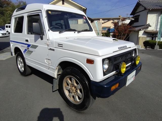 ジムニー インタークーラーターボ　４ＷＤ　パノラミックルーフ　車検２年付　５速ミッション　タイミングベルト・ウォーターポンプ交換　純正ボディサイドステッカー製作貼付（6枚目）