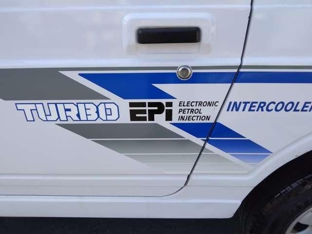 ジムニー インタークーラーターボ　４ＷＤ　パノラミックルーフ　車検２年付　５速ミッション　タイミングベルト・ウォーターポンプ交換　純正ボディサイドステッカー製作貼付（15枚目）