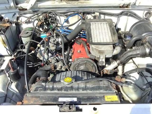 ジムニー インタークーラーターボ　４ＷＤ　パノラミックルーフ　車検２年付　５速ミッション　タイミングベルト・ウォーターポンプ交換　純正ボディサイドステッカー製作貼付（35枚目）