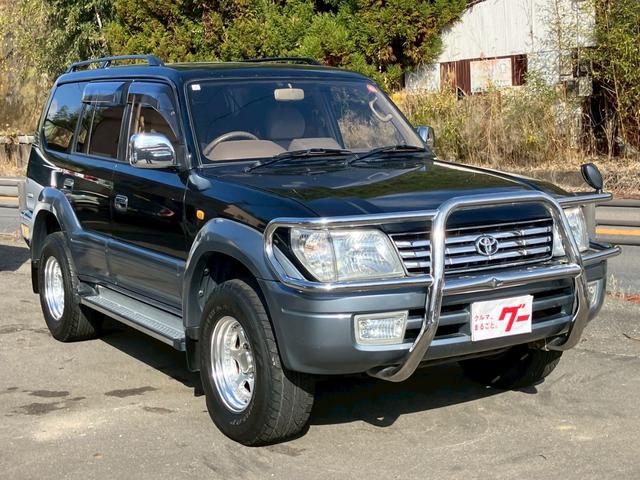 ランドクルーザープラド TXリミテッド ディーゼルターボ 4WD サンルーフ ルーフレール 3列シート8人乗り グリルガード 社外16インチアルミ 背面タイヤ 電動格納ドアミラー ETC(3枚目)