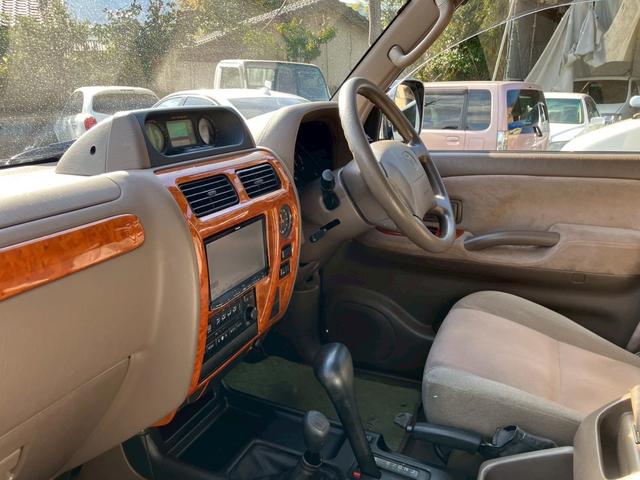 ランドクルーザープラド TXリミテッド ディーゼルターボ 4WD サンルーフ ルーフレール 3列シート8人乗り グリルガード 社外16インチアルミ 背面タイヤ 電動格納ドアミラー ETC(38枚目)