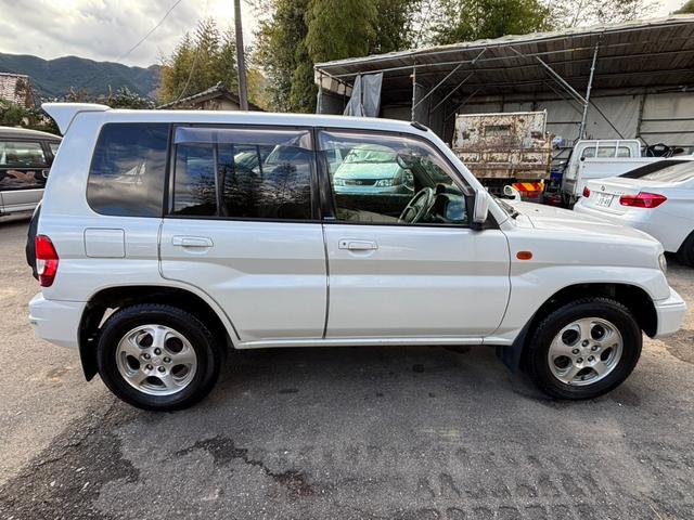 パジェロイオ パールパッケージ　ＥＴＣ装備、４ＷＤ、パワステ、パワーウインドウ、ナビ、エアバック（4枚目）