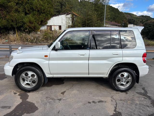 パジェロイオ パールパッケージ　ＥＴＣ装備、４ＷＤ、パワステ、パワーウインドウ、ナビ、エアバック（8枚目）