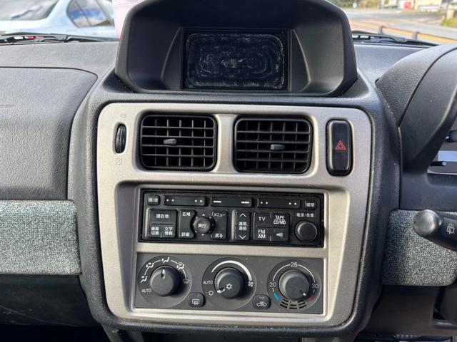 パジェロイオ パールパッケージ　ＥＴＣ装備、４ＷＤ、パワステ、パワーウインドウ、ナビ、エアバック（11枚目）