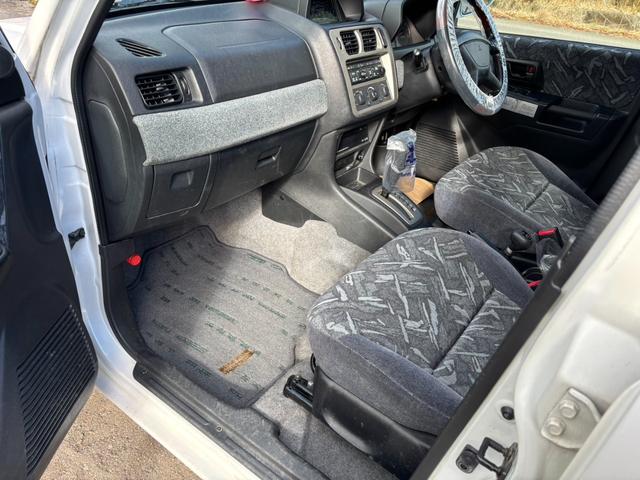 パジェロイオ パールパッケージ　ＥＴＣ装備、４ＷＤ、パワステ、パワーウインドウ、ナビ、エアバック（31枚目）