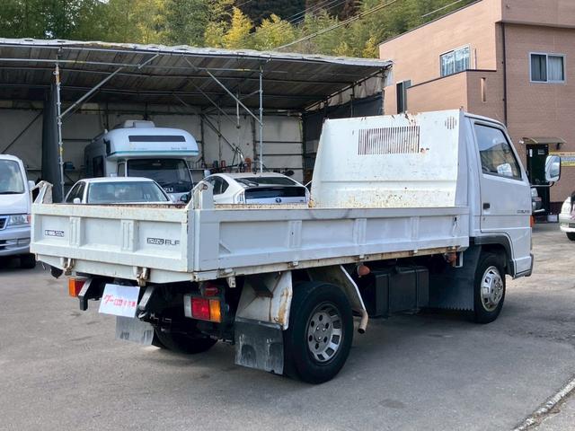 エルフトラック ダンプ　５速マニュアル　ディーゼル　２ｔ積み　リアＷタイヤ　エンジン型式４ＢＥ１　極東開発ＤＤ０２０８　荷台内寸４６９×１６９×１９７　走行９６４００ｋｍ　３人乗り（8枚目）